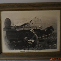 Couple with Covered Wagon