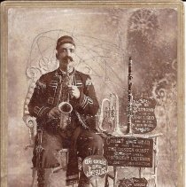Joe the Turk cabinet card instruments signs