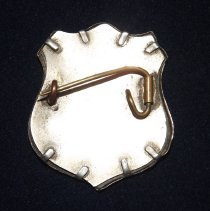 2016.49.1 Salvation Army Badge reverse