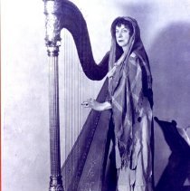 Evangeline Booth in Costume Playing the Harp