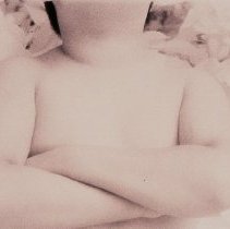 Irwin with his arms folded