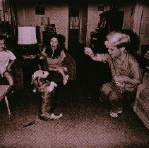 The Little People of America (family playing with dog)