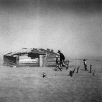 Farmer and sons walking in dust storm, Cimarron County, Oklahoma