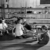 Agricultural and packing house workers's children playing in the twenty-fou