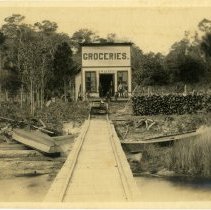 Front view of "Groceries. G.W. Harris" store.