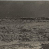 Black scene- waves crashing during Gale