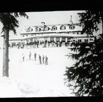 Children on sled with line of people