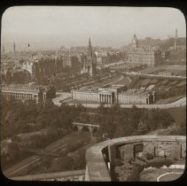 Sepia tone image of an aerial view of a city. 1920's.