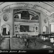 Interior of a fancy room. Many pianos.