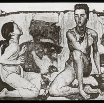 Image of a man sitting with his leg folded up and arm folded across his sho