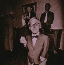 The People of America (man in bow tie with longish blond hair and glasses)