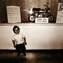 The People of America (little man and motorcycle)
