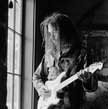 Neil Young practicing by window, Broken Arrow Ranch