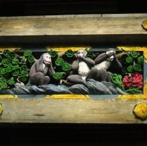 Three monkies carving