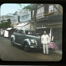 Man next to automobile