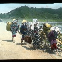 women on country road