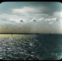 Water, clouds and boats