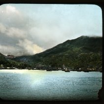 Island village under cloudy sky