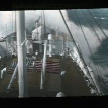 waves crash on ship deck