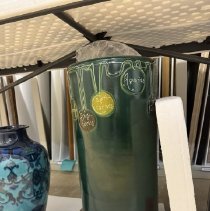 Rhead Faience Zodiac Umbrella Stand Featuring a Glossy Green Glaze