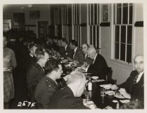 Group of Men Seated at Dinner