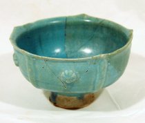 Footed bowl with rosettes