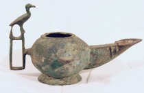Oil lamp with bird
