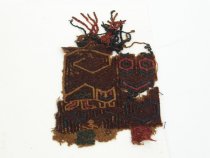 Embroidered border with feline ocualate being