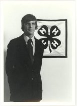 [boy with 4-H banner]