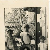 Paul Daughters on store porch