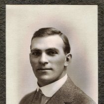 Leonard Paul portrait with wide collar