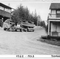 Boat in front of Store and Idaho Inn