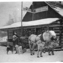 Nell Shipman in front of the Leonard Paul Store