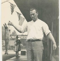 Leonard Paul with fish at Store