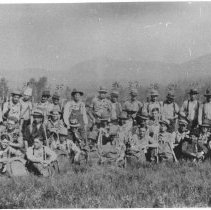 Forest Service Crew picture with tools in a field