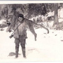 Man with mountain lion