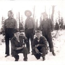 Five men in the snow