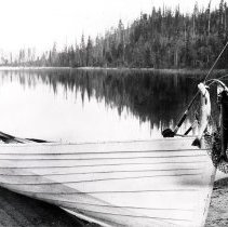 fish, net, pole on boat- from U of I
