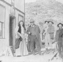 People standing in front of a store, ca. 1905