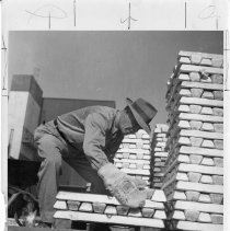 Man Handling Hot Ingots  -  BMI Series