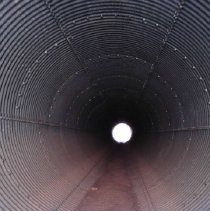 Hiking through a culvert, Lake Mead