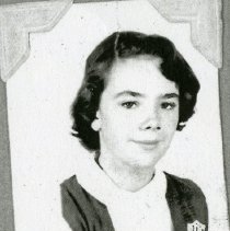 School photo of a girl in a St. Peter the Apostle Catholic School uniform
