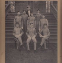 9 cadet officers in front of barracks