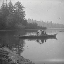 Family in Indian canoe