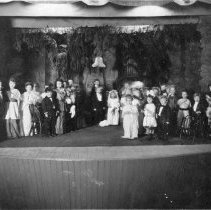 Stage play of children portraying a wedding