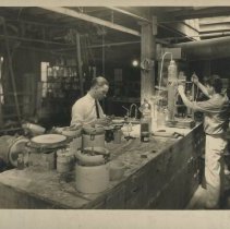 Cowan employees mixing glazes