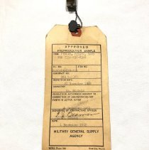 Tag attached to peeler (2019.43.15) Image II