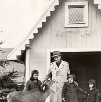 Carl Bozenski founder of Christmas Village with 3 unid.children & Rudolph