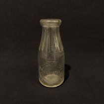 G. Jaschinsky glass milk bottle (2016.025.003)