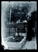 Father Martin Dornbush, SS.CC. at Fr. Damien's grave, Kalawao, ca. 1923.